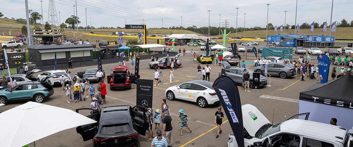 Visitors viewing EVs at event